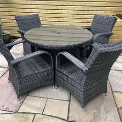 4 Seater Rattan Garden Dining Set including seat cushions, and cover for Winter.