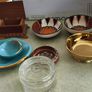 7 trinkelt itmes Large Mint Green Fern Bowl and small bowl DANU Designer Ceramics 20.00 E.Crystal glass lided trinklet dish 15.00 E.Gold dish 10.00E.  Southe afirca bowl smale on 8.00 E. other        larger one 10.00E.  Marccoin one 8.00E.  wood trinklet  Image 2