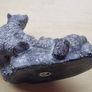 The figurine is a bears sculpture, manufactured by Wolf Originals in Canada. Image 8