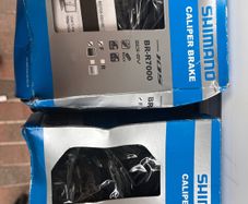 Shimano caliper front and back brakes.