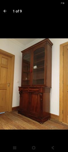 Two-door antique Victorian mahogany bookcase