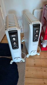 2 x DeLonghi Dragon 4 TRD41025T 2.5kW oil-filled radiators with 24hr timer