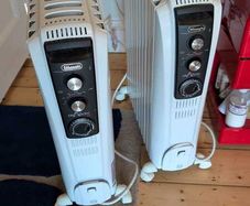 2 x DeLonghi Dragon 4 TRD41025T 2.5kW oil-filled radiators with 24hr timer