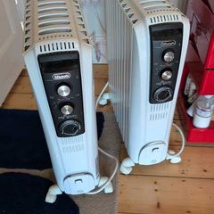 2 x DeLonghi Dragon 4 TRD41025T 2.5kW oil-filled radiators with 24hr timer