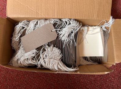 Box of strung tags/labels