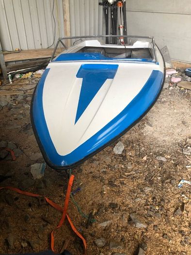 Fletcher speed boat and an Suzuki 85 hp electric n