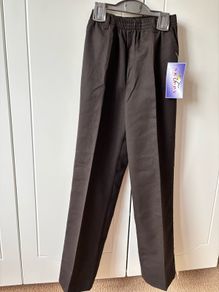 2 Boys brown Skippy school/dress trousers-  ages 10-11 & 11-12 .  Being sold fir 15 euros each
