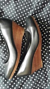 Black shoes with brown wedge heel