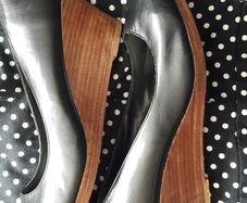 Black shoes with brown wedge heel