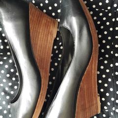 Black shoes with brown wedge heel