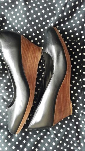 Black shoes with brown wedge heel