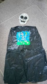 Skeleton mask and cloak