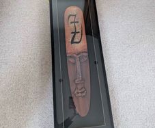 framed hand carved wooden tribal mask