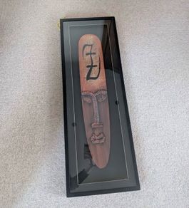 framed hand carved wooden tribal mask