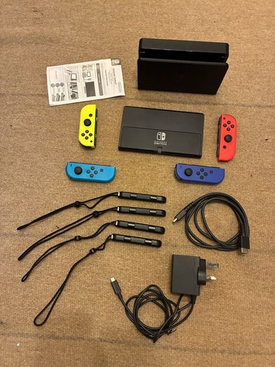 Nintendo Switch OLED bundle (with 4 Joy-Cons, 3 games)