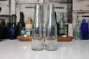385 - Set of 2 Vintage Collectible Decorative Clear Glass Cantrell and Cochrane Mineral Bottles