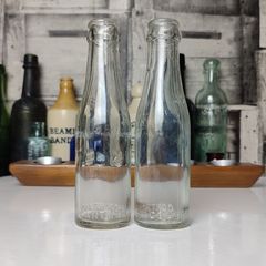 385 - Set of 2 Vintage Collectible Decorative Clear Glass Cantrell and Cochrane Mineral Bottles