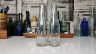 385 - Set of 2 Vintage Collectible Decorative Clear Glass Cantrell and Cochrane Mineral Bottles