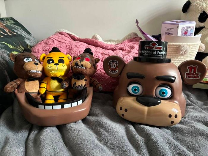 Five Nights at Freddys plushies and dragon figures