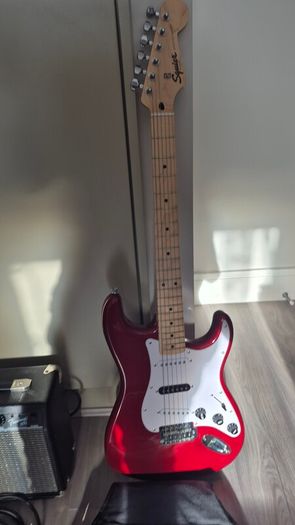 Squier stratocaster + amp and accessories