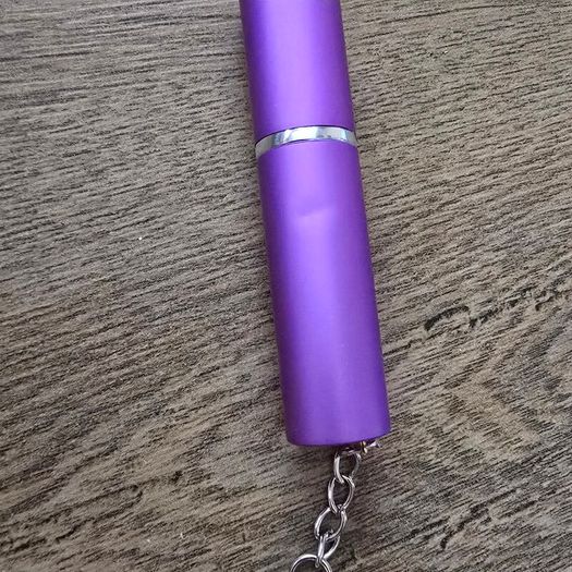 Perfume travel spray bottle keyhanger