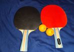 Table tennis paddle and balls