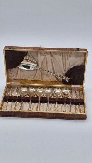 Cutlery set in a box .