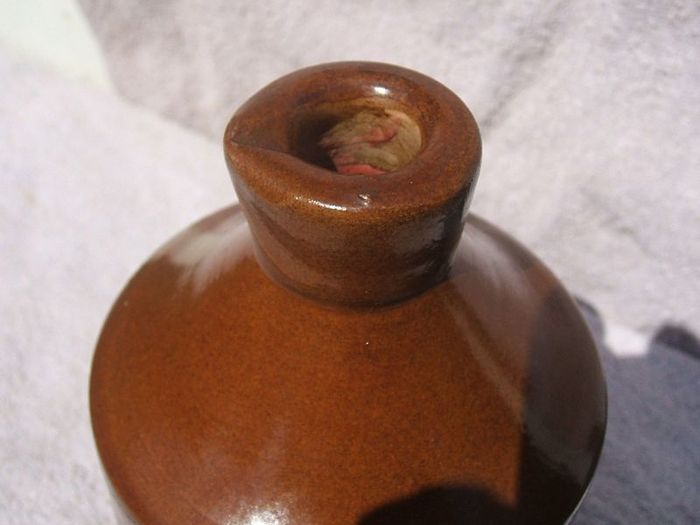 Stoneware antique ink bottle (large size 7.5" high) - made by Joseph Bourne of Denby (1880's - 1910's). Superb condition with remnants of label.
