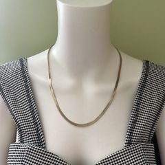 Gold tone snake chain necklace