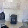 marble fireplace and stove Image 4