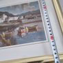 Framed signed print of sea side village. Image 4