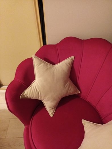 2 cream star shaped velvet cushions