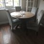 table and four chairs and four cream chair covers Image 2