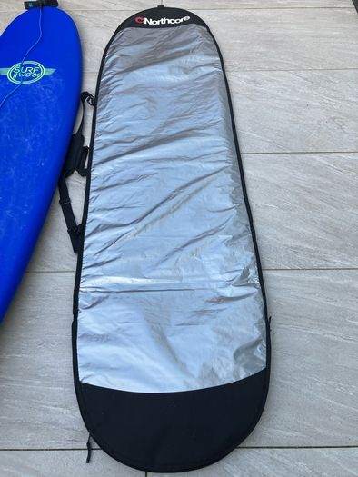 surfboard, bag and leash