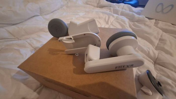 meta quest 3 with controllers and earmuffs, all working good condition