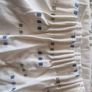 cream heavy curtains with ble & green pattern Image 3