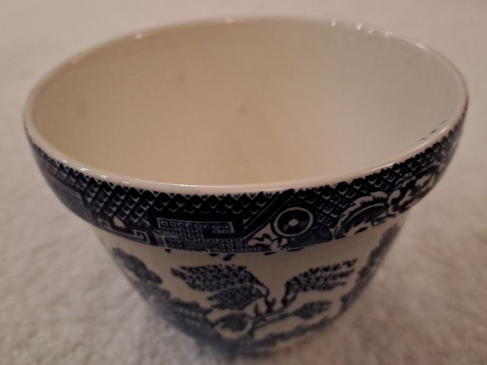Antique blue and white willow pattern