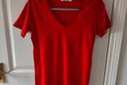 Red short sleeve top size 10
