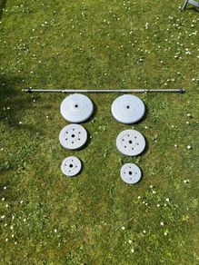 32.5kg Weight plates and Barbell with clips