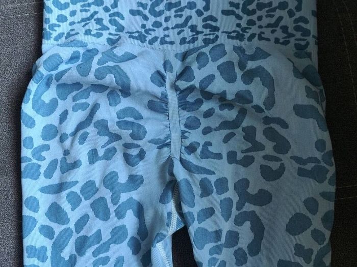 Brand New Animal print leggings, light blue, size 10