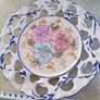 Vintage  19 cm. dimeter flowery  hinging wall plat made in Portugal. Image 3