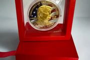 Red Box with Trump Commemorative Coin, new, unopened.