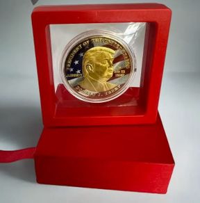 Red Box with Trump Commemorative Coin, new, unopened.