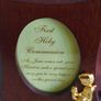 wooden photo frame commemorative plaque for a First Holy Communion. The plaque features an oval-shaped insert with a message and a small golden figure of a child praying. Image 4