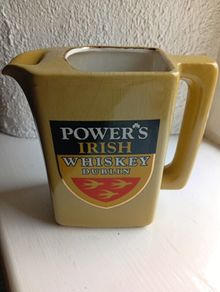 powers whiskey jug