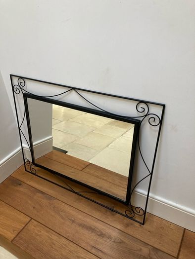 large mirror black cast iron