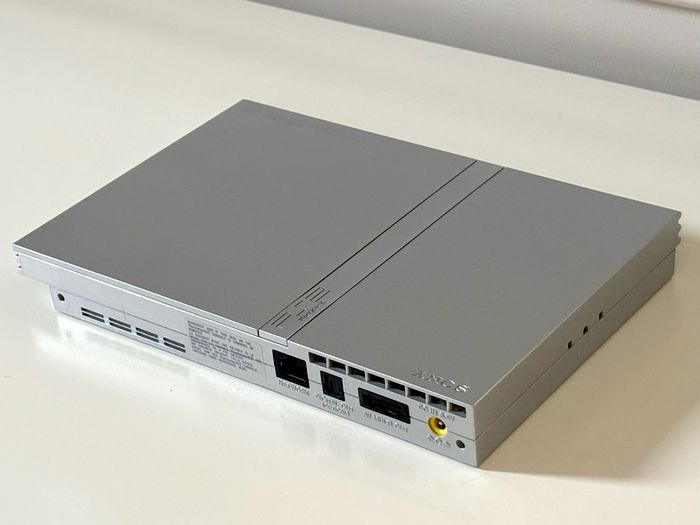 Original Sony PlayStation 2 Slimline Console in Satin Silver Boxed and Beautiful