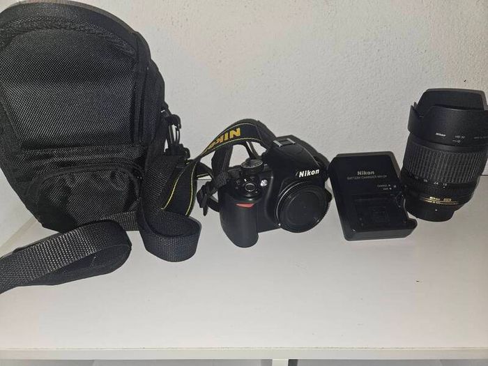 Nikon D3100 with lens