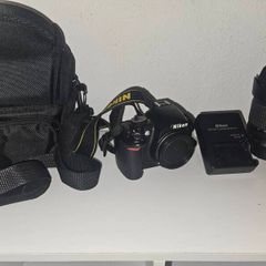Nikon D3100 with lens