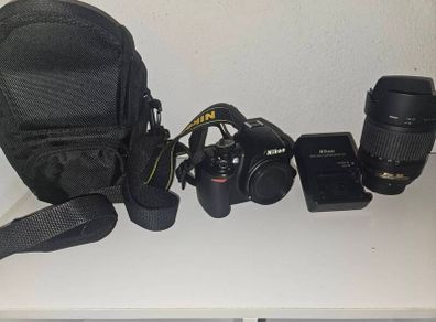 Nikon D3100 with lens